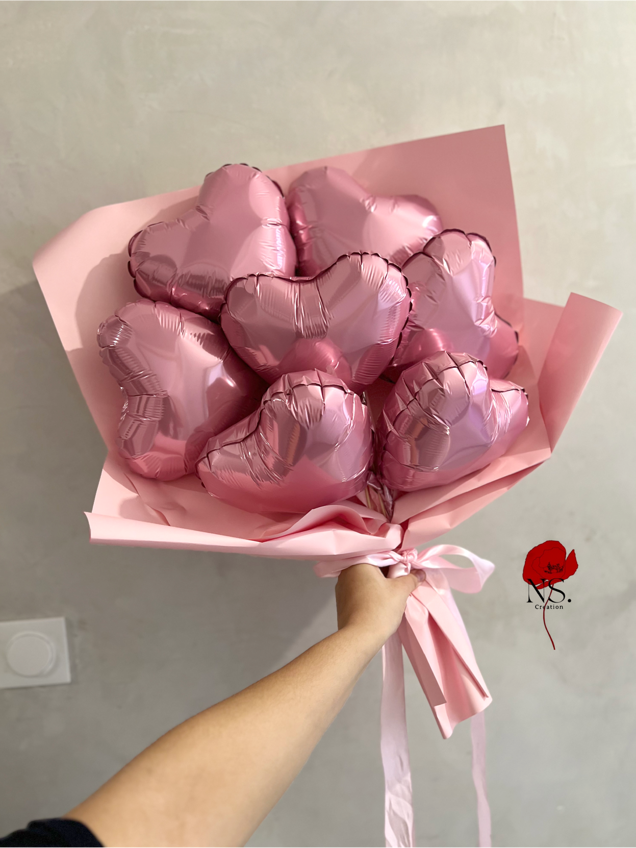 Bouquet de ballons rose en forme de coeur