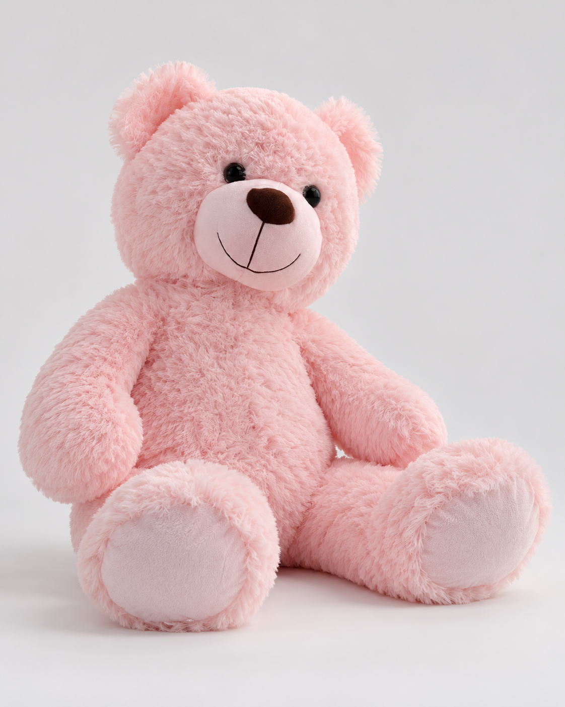 Ours en peluche rose Bonbon assis, autre angle
