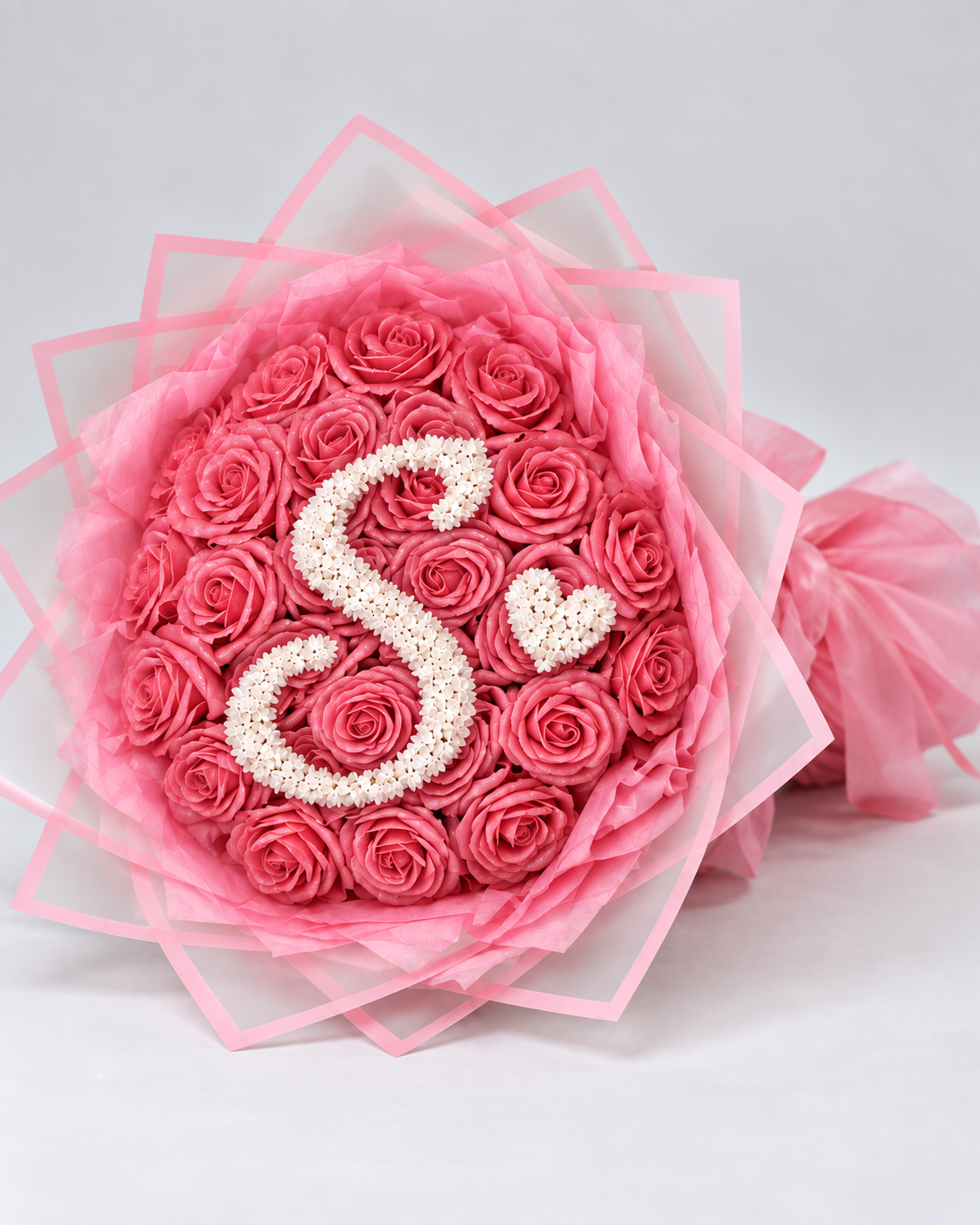 Bouquet NINA de 25 roses éternelles rose framboise, vue de côté
