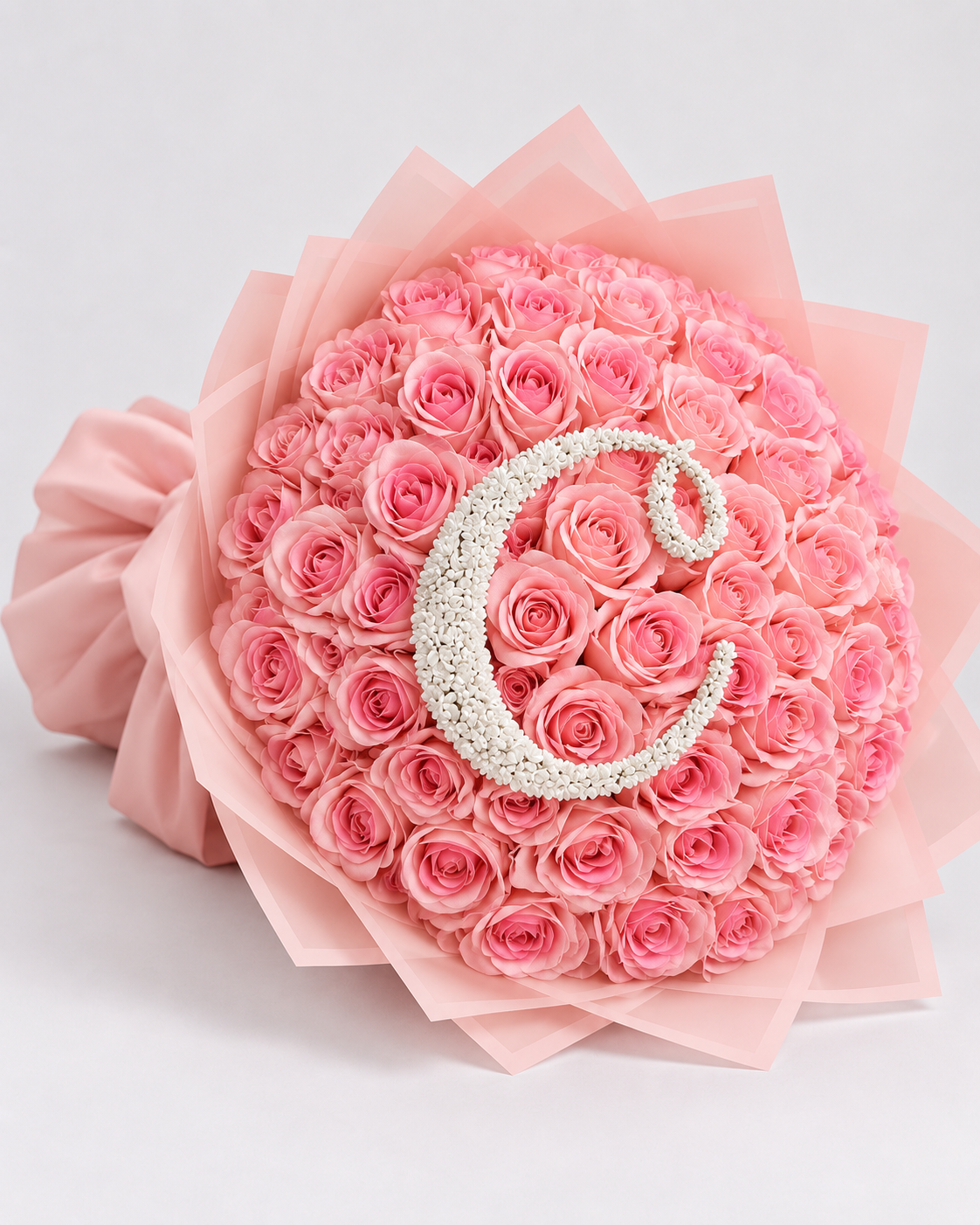 Bouquet SHAINEZ de roses éternelles roses avec lettre perlée, vue de côté