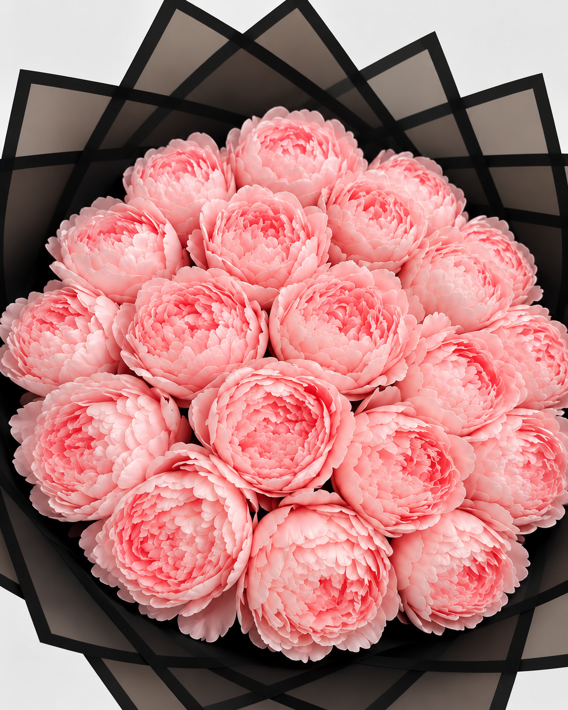 Gros plan sur les pivoines éternelles rose clair du bouquet YASSMINE